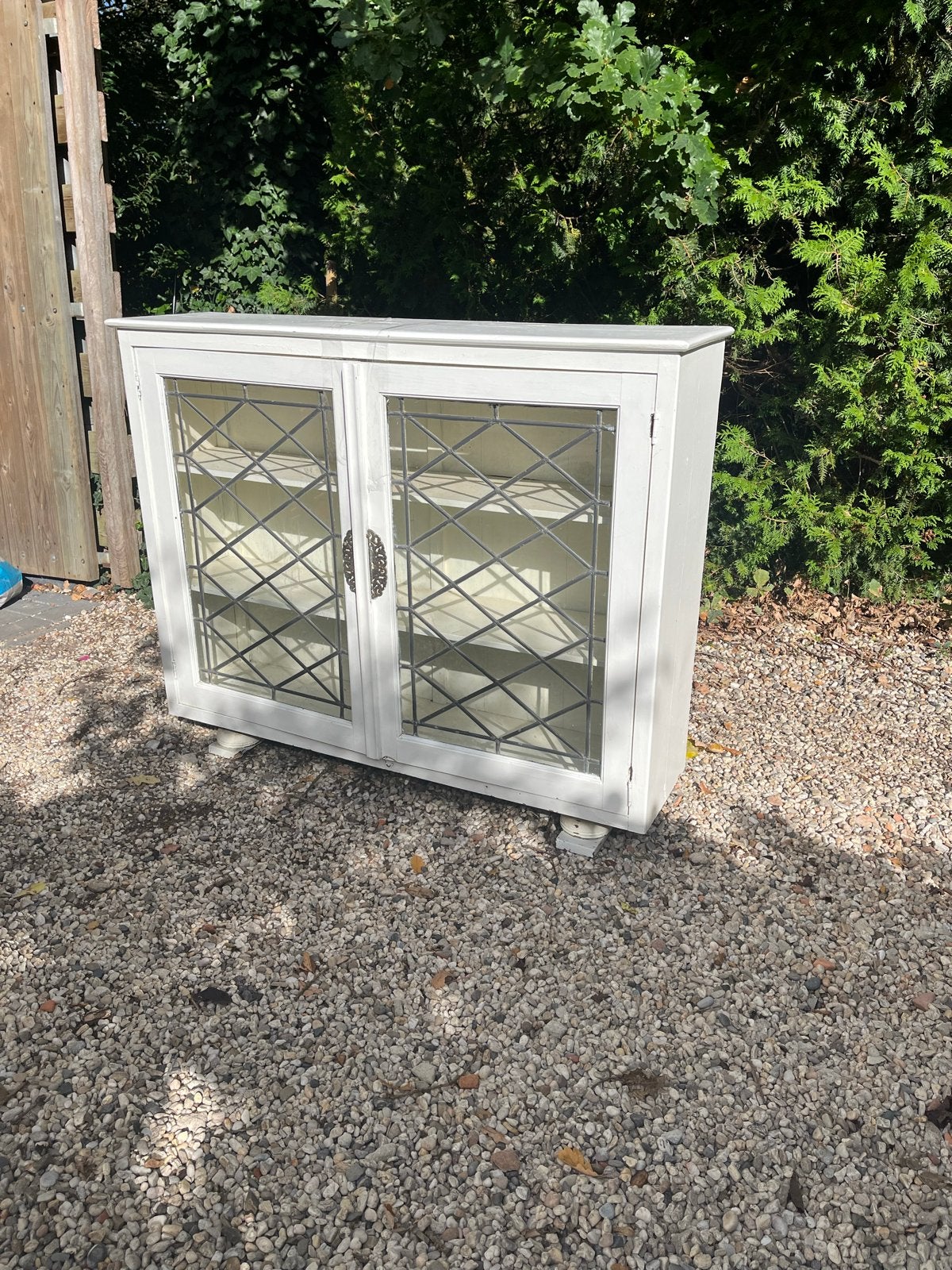 Antieke vitrinekast met glas-in-lood deuren, Ophalen