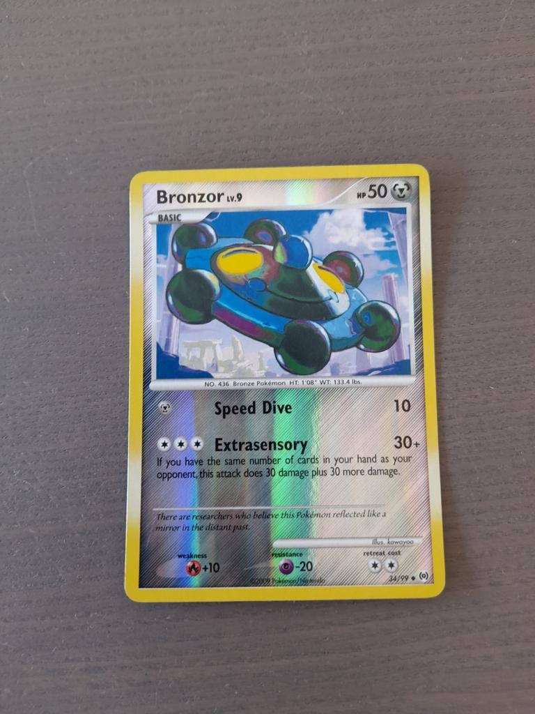 2009 arceus 34/99 bronzor reverse, Ophalen of Verzenden, Gebruikt, Losse kaart, Foil