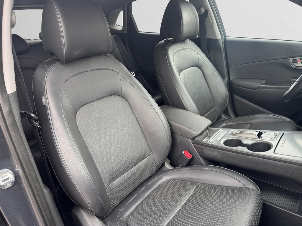 Hyundai KONA EV Premium+ 64 kWh- SOH 99%, Stuur/Stoelverwarm, Auto's, Hyundai, 14 kWh, Gebruikt, Met garantie (alle), 575 min