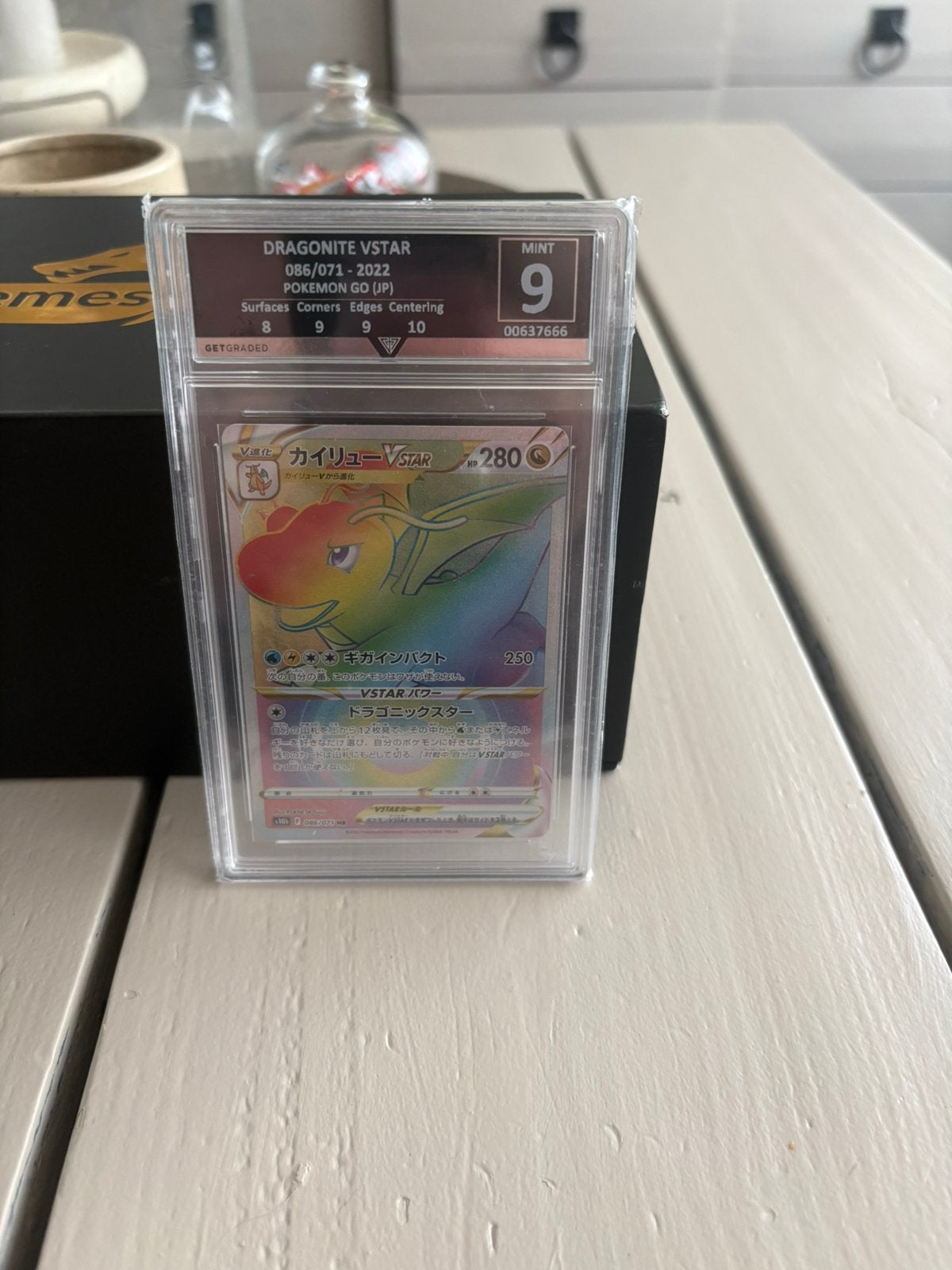 Dragonite vstar rainbow grade 9, Ophalen of Verzenden, Zo goed als nieuw, Meerdere kaarten, Foil