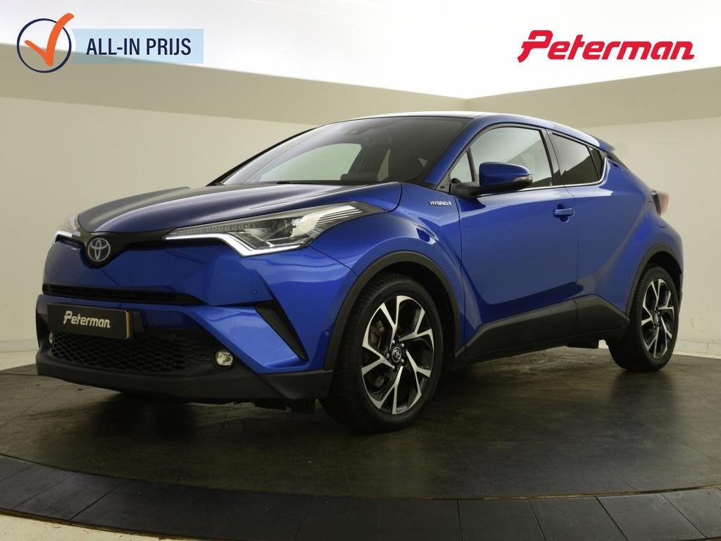 Toyota C-HR 1.8 Hybrid Style | Allseasons | Leder | Blindspo, 12 maanden, Euro 6, 4 cilinders, Blauw