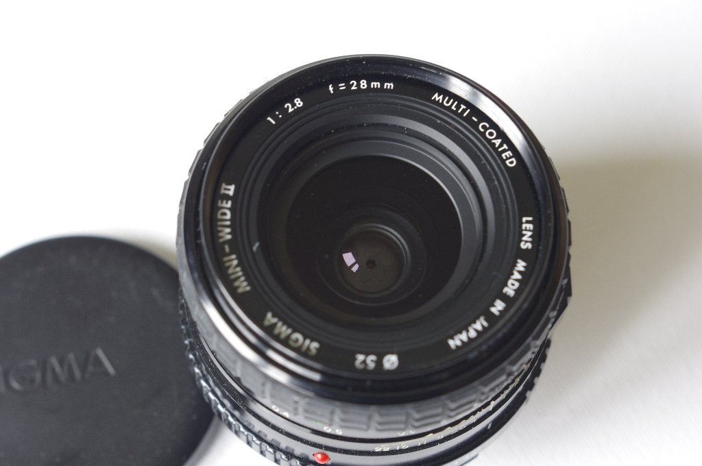 Sigma Mini-Wide ll, 28mm, F2,8 voor Minolta MD, Ophalen of Verzenden, Gebruikt, Groothoeklens