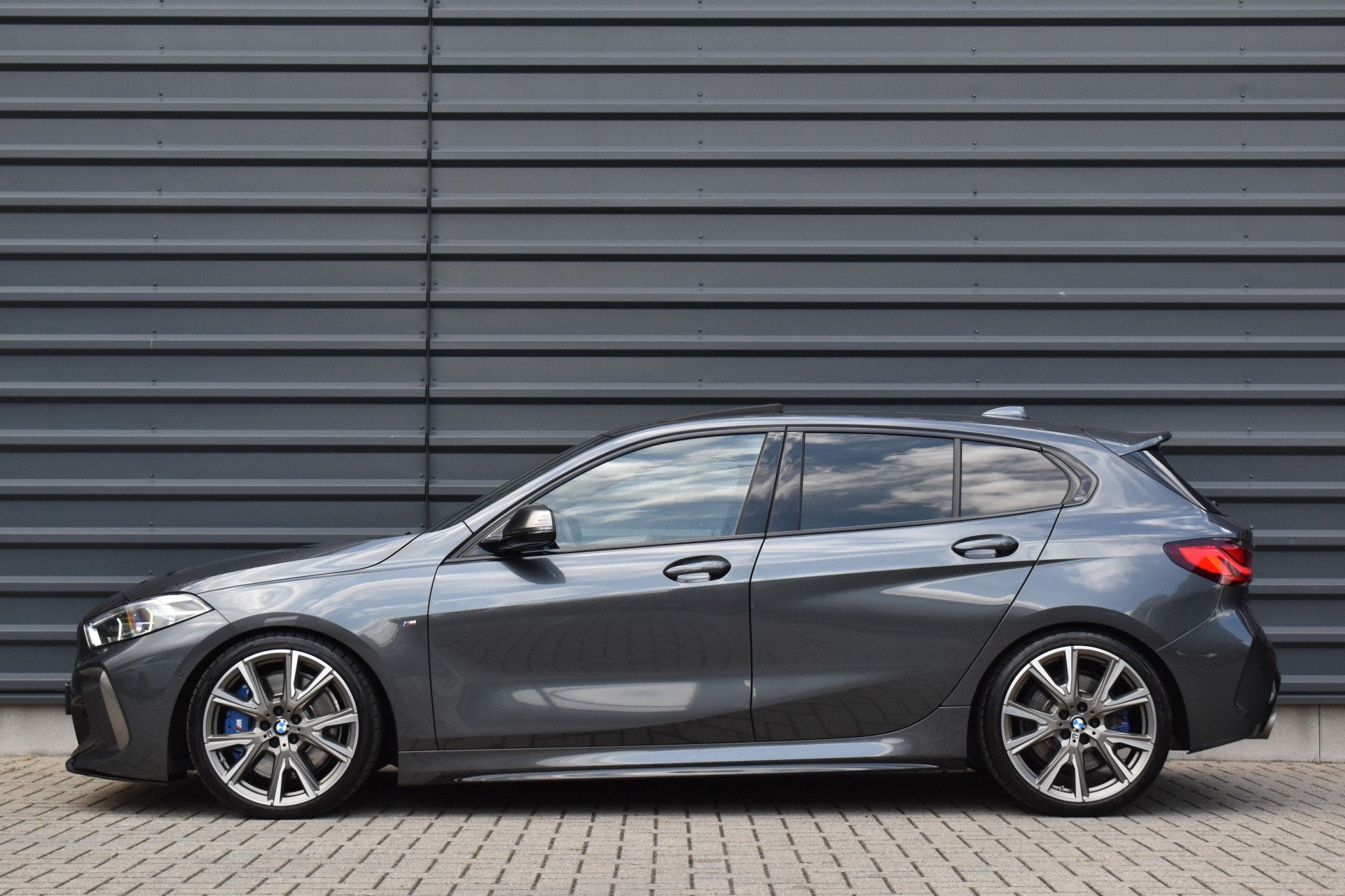 BMW 1 Serie M135i xDrive 306pk | Pano | Harman/Kardon | Head, Auto's, BMW, Gebruikt, 4 cilinders, Leder en Stof, 14 km/l