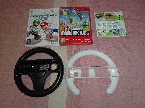 Zwarte Nintendo Wii met mario kart, mario bros en wii sports, Ophalen, Gebruikt, Met 1 controller, Met games