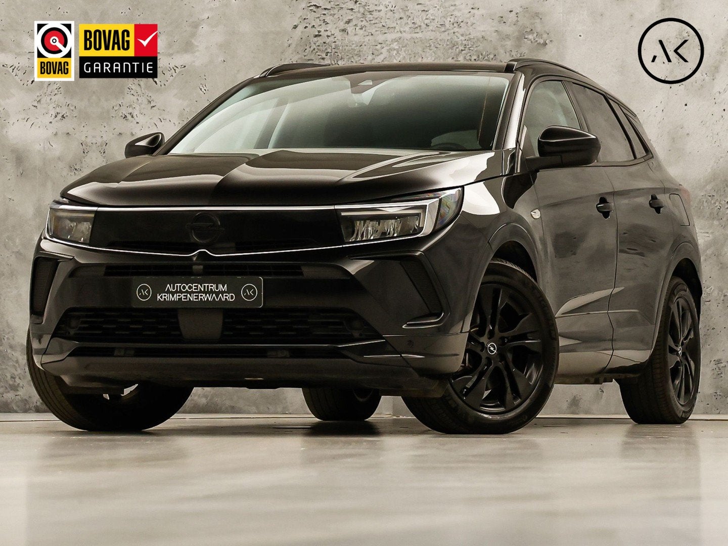 Opel Grandland 1.6 Turbo Plug-In Hybrid Elegance Black Pack, Auto's, 12 maanden, 4 cilinders, Leder en Stof, Zwart