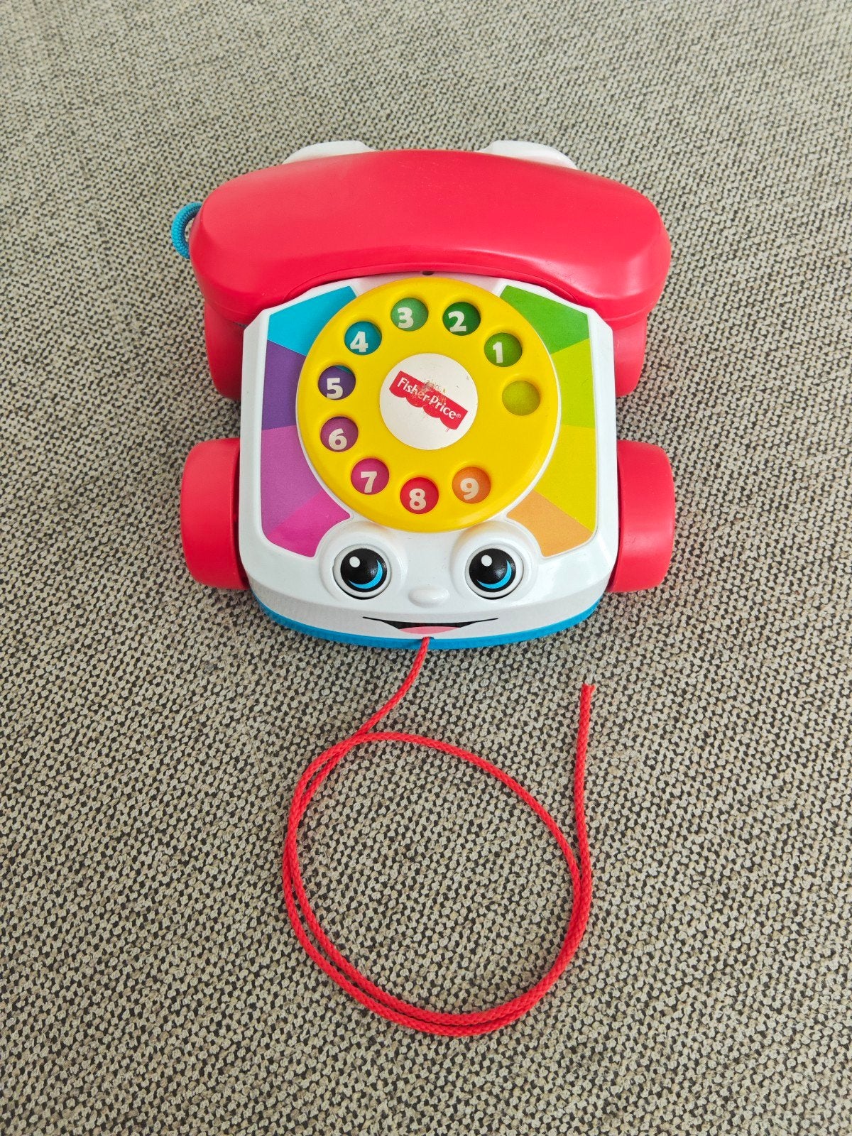 Fisher-Price Telefoon met wieltjes en draaischijf, Kinderen en Baby's, Ophalen of Verzenden, Zo goed als nieuw, Duw- of Trekspeelgoed