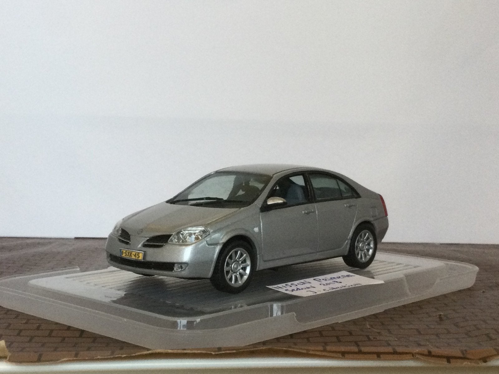 Nissan Primera Hatchback 2003 Zilvergrijs J-Collection 1:43, Ophalen of Verzenden, Zo goed als nieuw, Auto, Overige merken