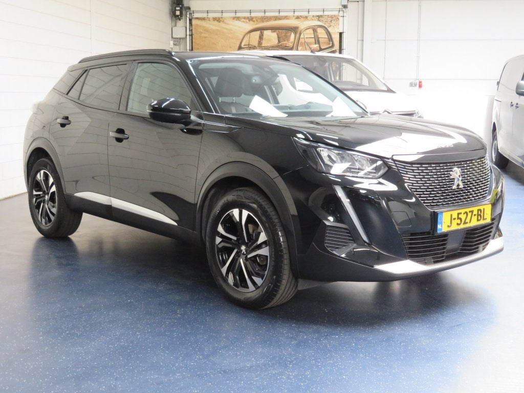 Peugeot 2008 1.2 PureTech Allure (bj 2020), Auto's, Voorwielaandrijving, Gebruikt, Euro 6, 1199 cc
