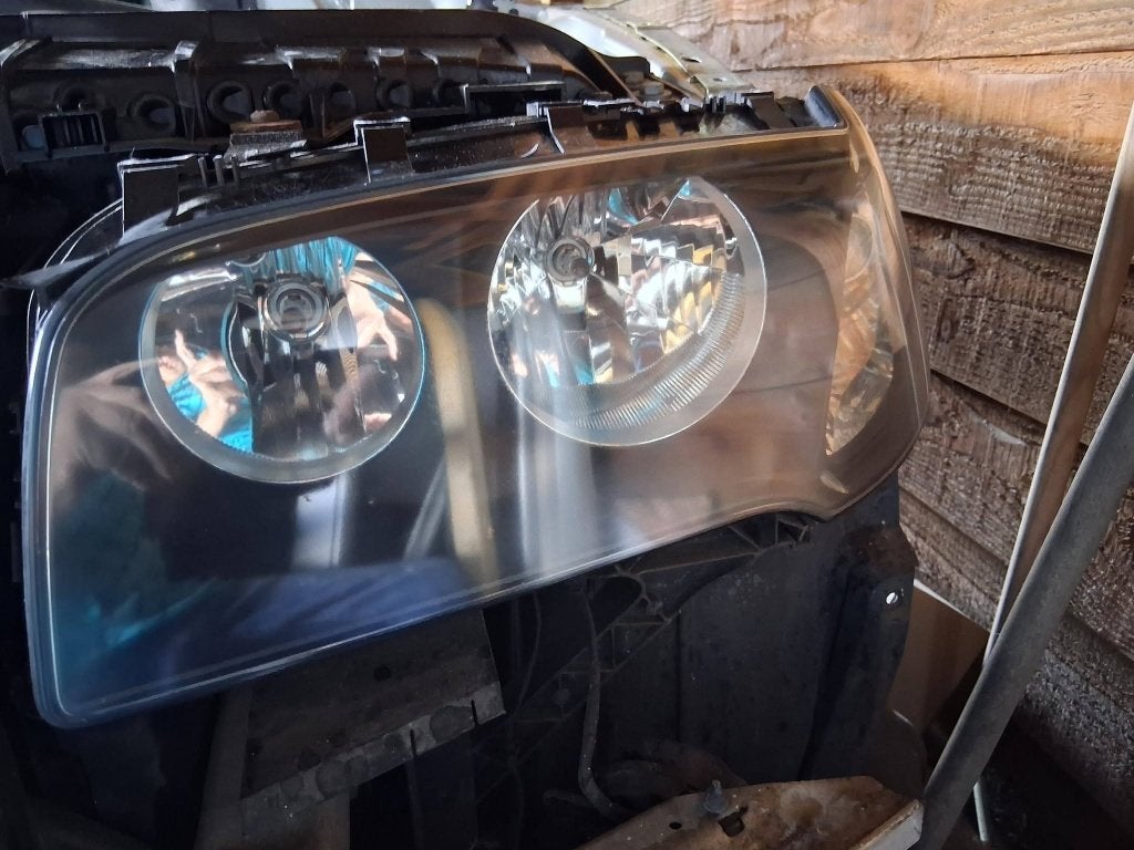 Koplampen BMW X3 E83., Ophalen, Gebruikt, BMW