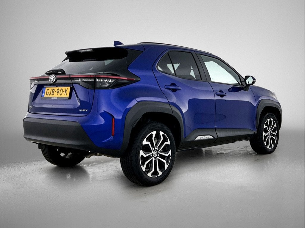Toyota Yaris Cross 1.5 Hybrid 115 First Edition (bj 2024), 12 maanden, Stof, Gebruikt, Blauw