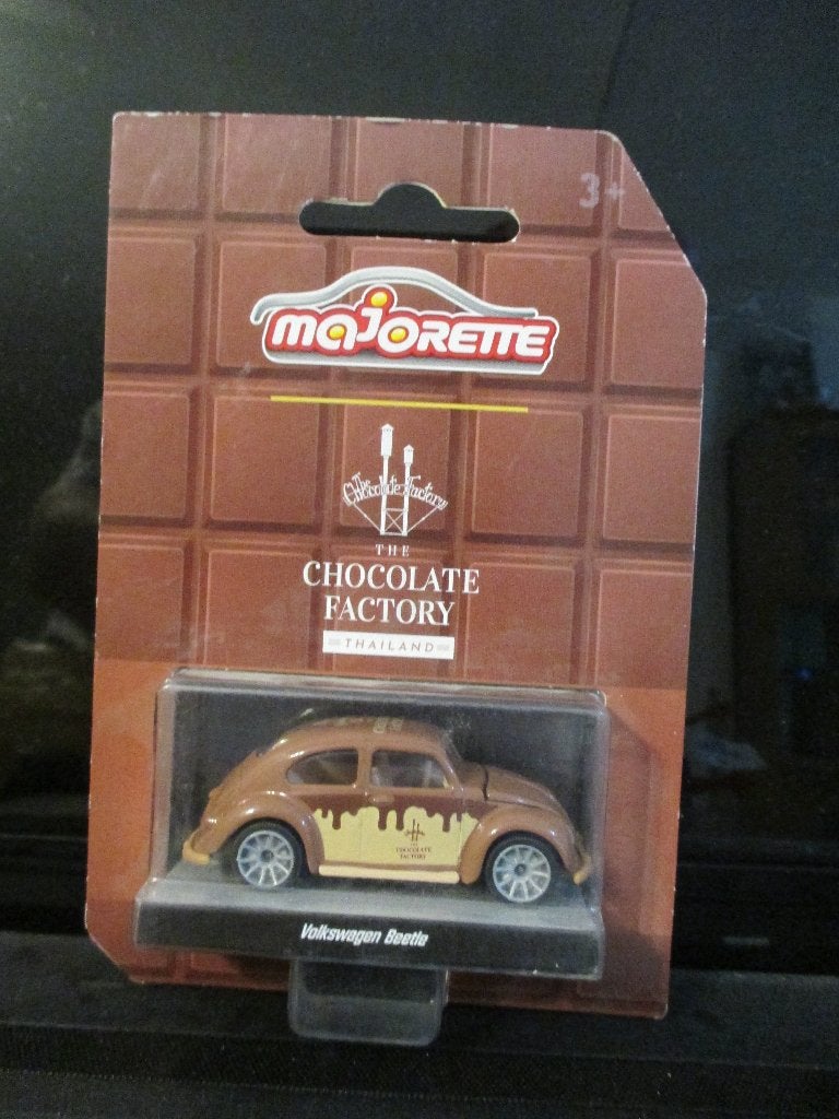 1:64 Volkswagen Kever Ovaal Majorette The Chocolate Factory, Hobby en Vrije tijd, Modelauto's | Overige schalen, Ophalen of Verzenden