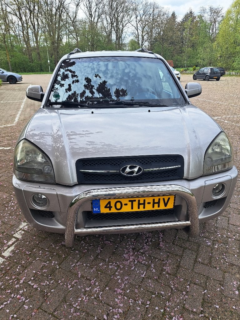 Hyundai Tucson 2.0 I styl  2WD 2005 Grijs, Auto's, Hyundai, 4 cilinders, Leder, 75 €/maand, Handgeschakeld