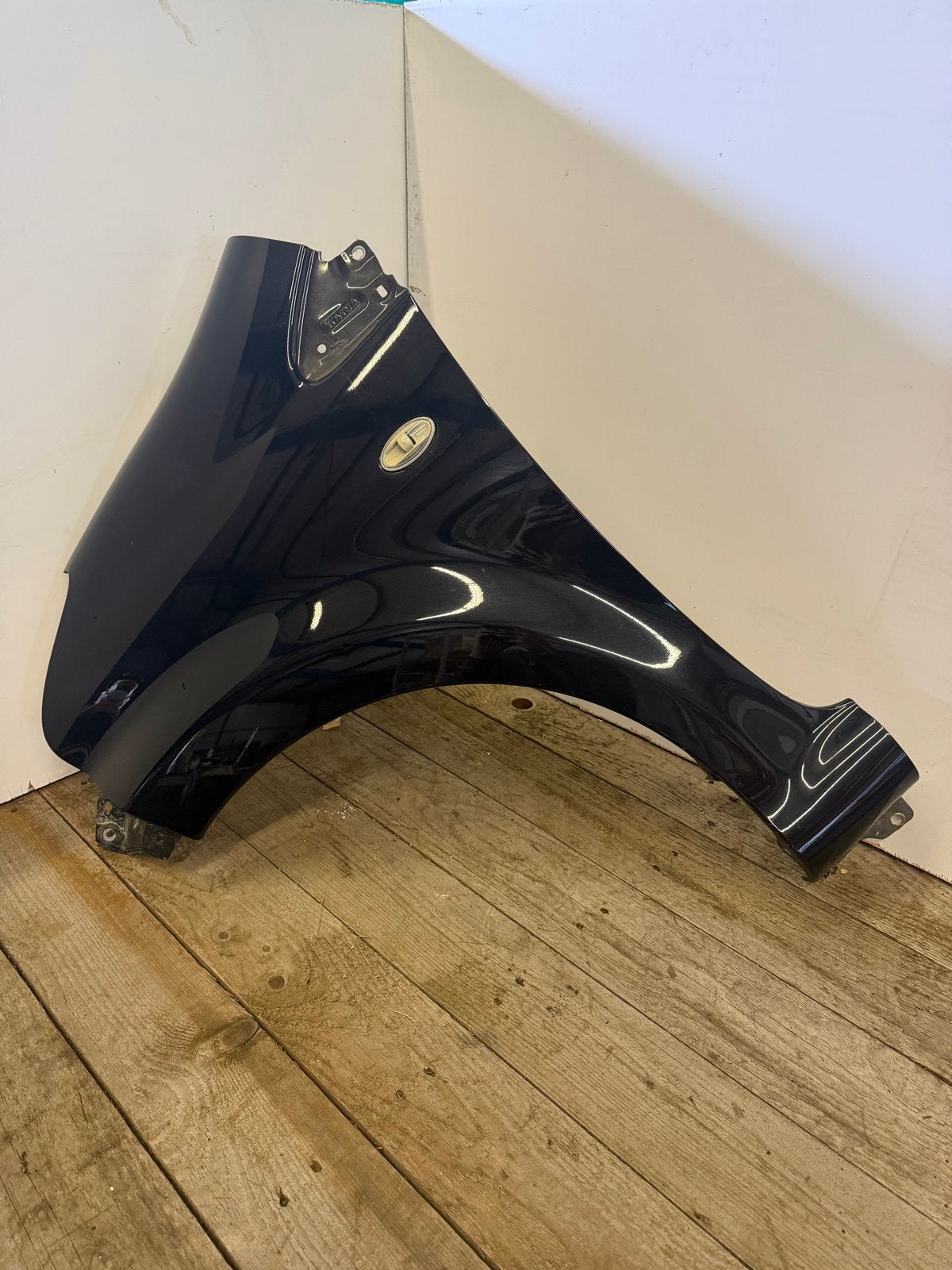 Spatbord links Toyota Aygo B10 zwart, Gebruikt, Links, Ophalen of Verzenden, Spatbord