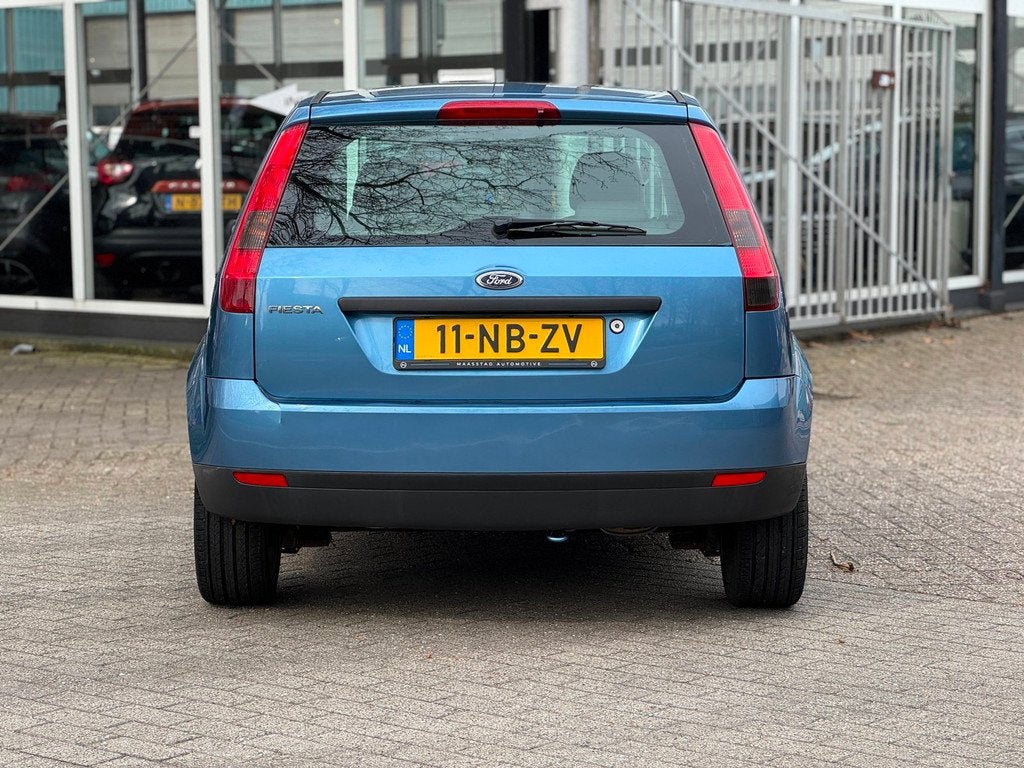 Ford Fiesta 1.25-16V Ambiente lage kms zuinig en betrouwbaar, Voorwielaandrijving, Stof, 1242 cc, 4 cilinders