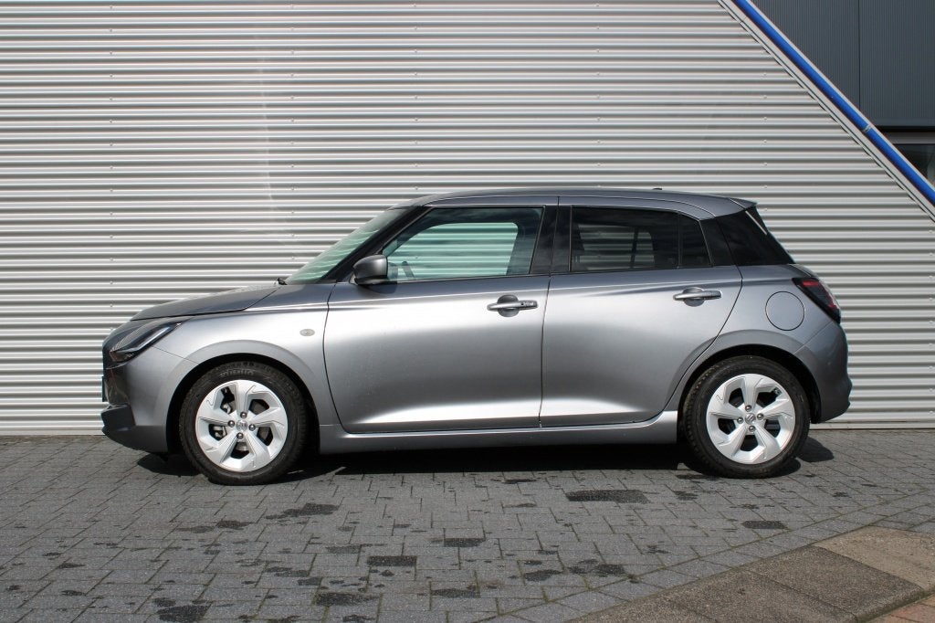 Suzuki Swift 1.2 Select SmartHybrid Automaat | Navi | Camera, Auto's, Stof, Gebruikt, 82 pk, Swift