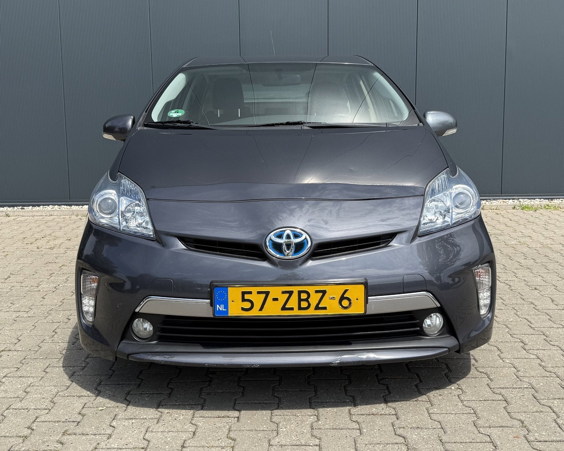 Toyota Prius 1.8 Plug-in Aspiration Airco Cruise Automaat AP, Auto's, Euro 5, Stof, Gebruikt, Zwart