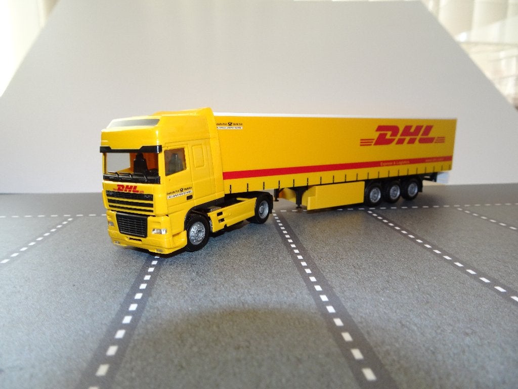854 herpa daf xf dhl oplegger 1:87 truck trein trailer, Ophalen of Verzenden, Zo goed als nieuw, Bus of Vrachtwagen, Herpa