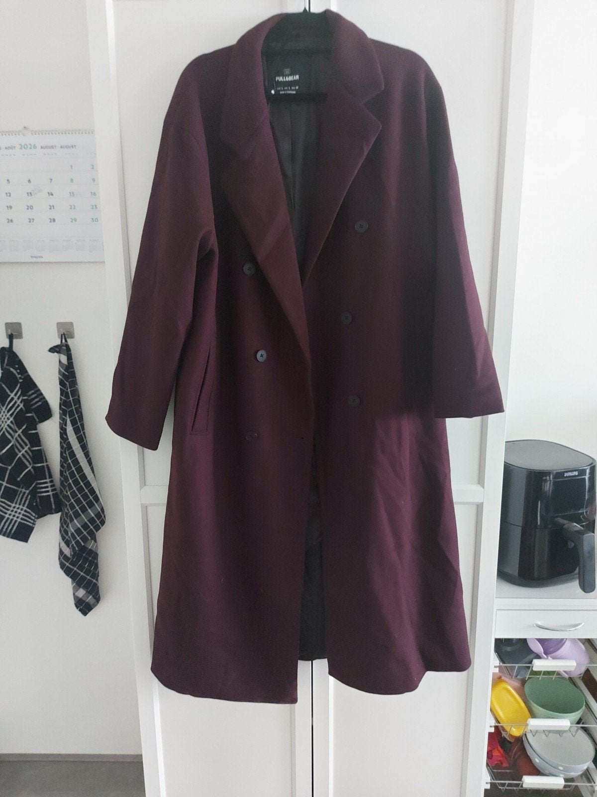 Lange aubergine kleurige winterjas maat L, Kleding | Dames, Ophalen, Zo goed als nieuw, Maat 42/44 (L), Overige kleuren