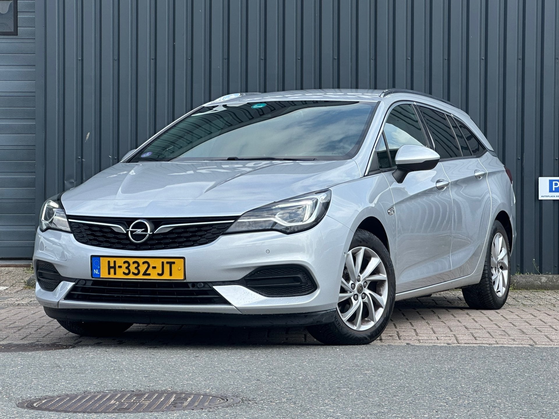 Opel Astra Sports Tourer 1.2 Elegance|TREKHAAK|CAMERA|, Voorwielaandrijving, Stof, Gebruikt, 1199 cc