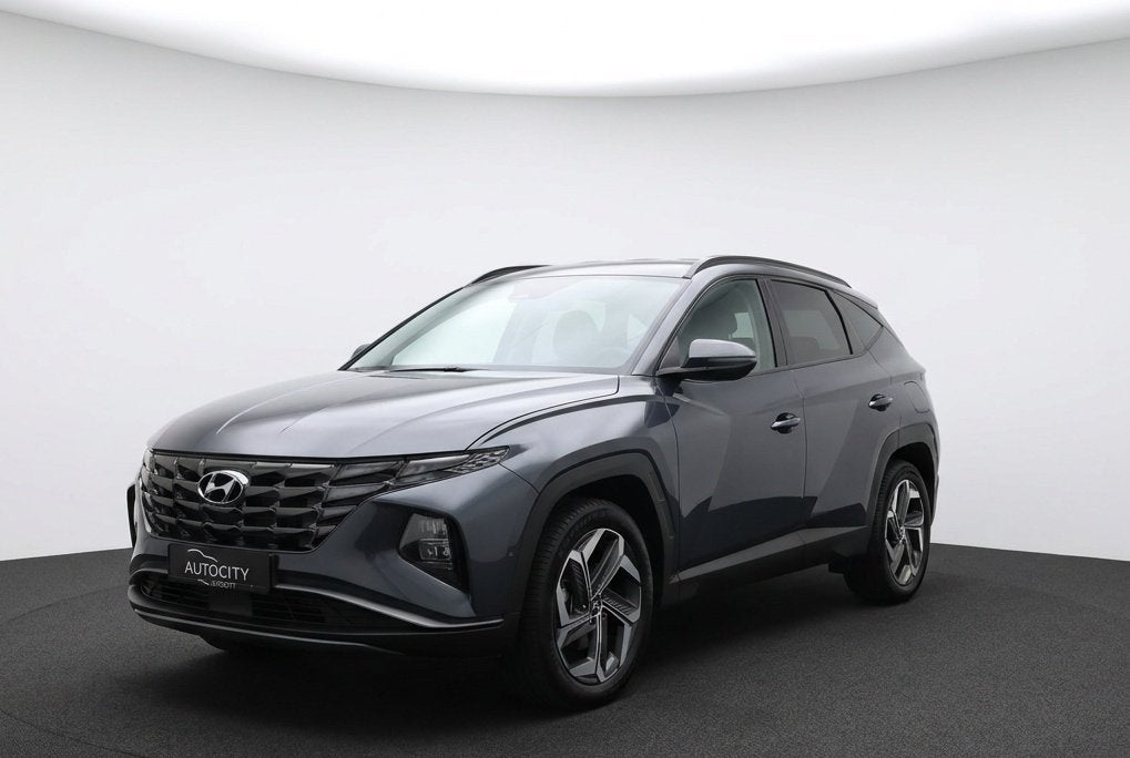 Hyundai Tucson 1.6 T-GDI PHEV Comfort 265pk l Camera l Blind, Auto's, Hyundai, Automaat, Stof, Gebruikt, 4 cilinders