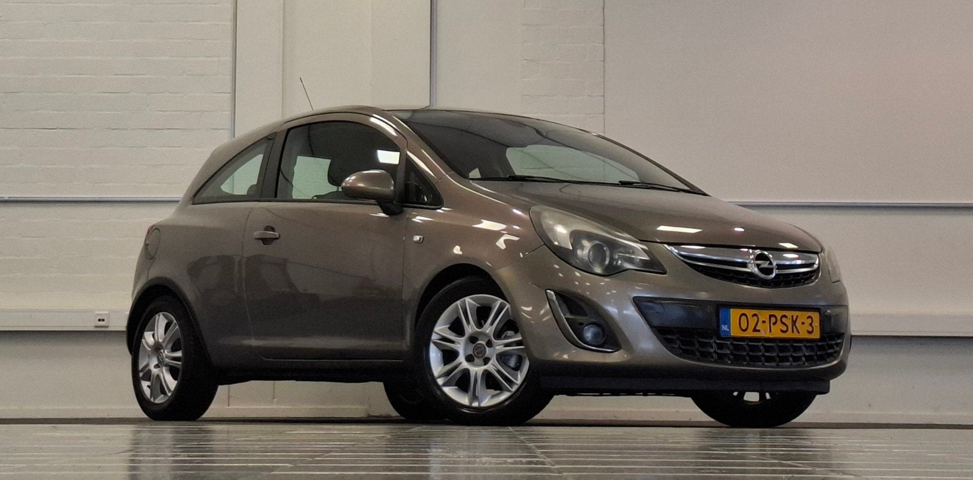 Opel Corsa 1.2-16V Cosmo Cruise Control Airco Garantie Parke, Auto's, Euro 5, Gebruikt, 750 kg, Bruin