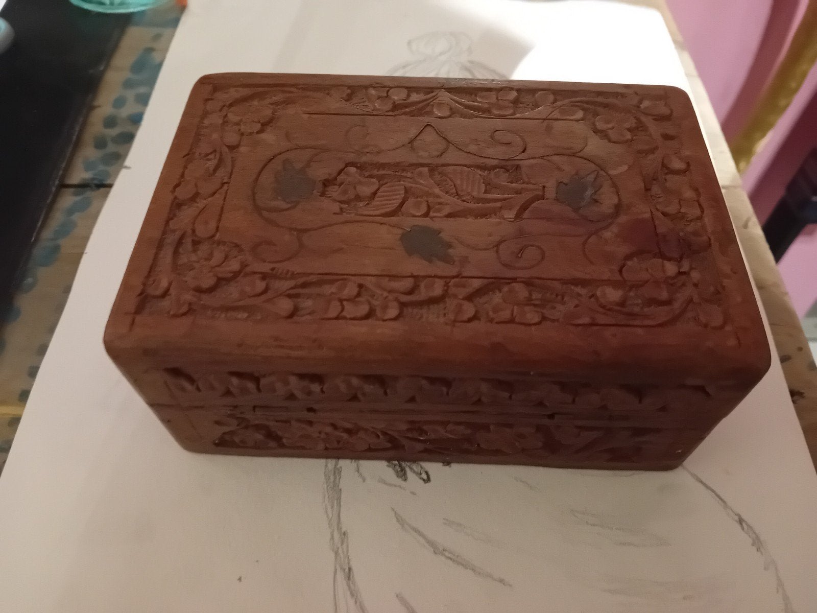 Houten sieradendoosje met handgesneden details, Ophalen