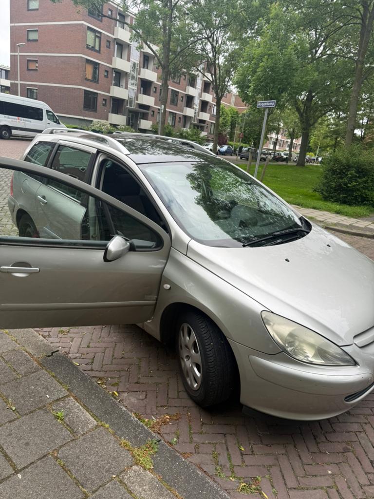 Peugeot 307 1.6 16V SW 2005 Grijs, Auto's, Peugeot, Benzine, C, Stationwagon, Handgeschakeld, Origineel Nederlands, Zilver of Grijs