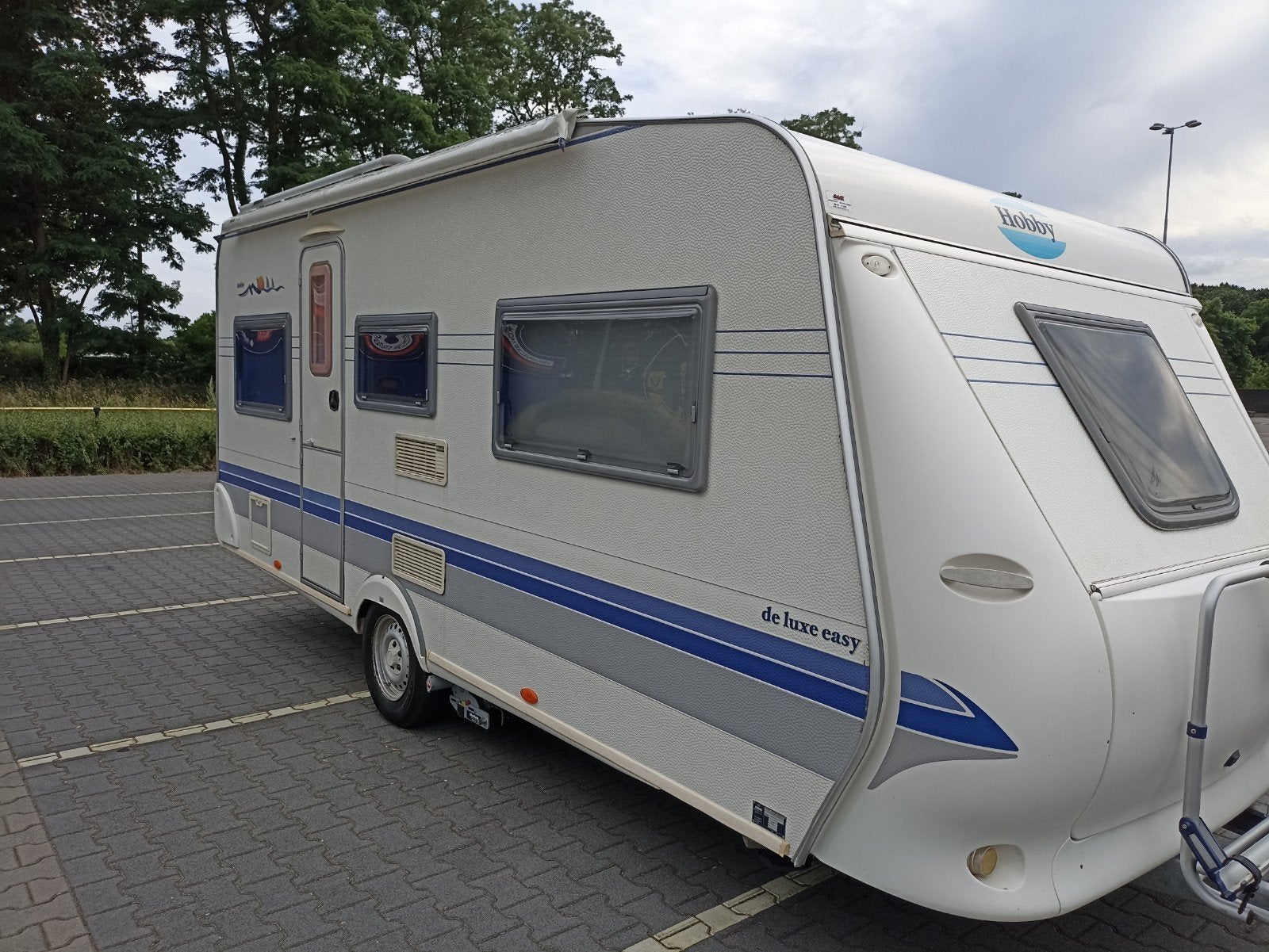 Hobby 495 UK Luxe Easy 2006/stapelbed/mover/onderhouden, Caravans en Kamperen, Rondzit, Particulier, 6 tot 7 meter, Tot en met 6
