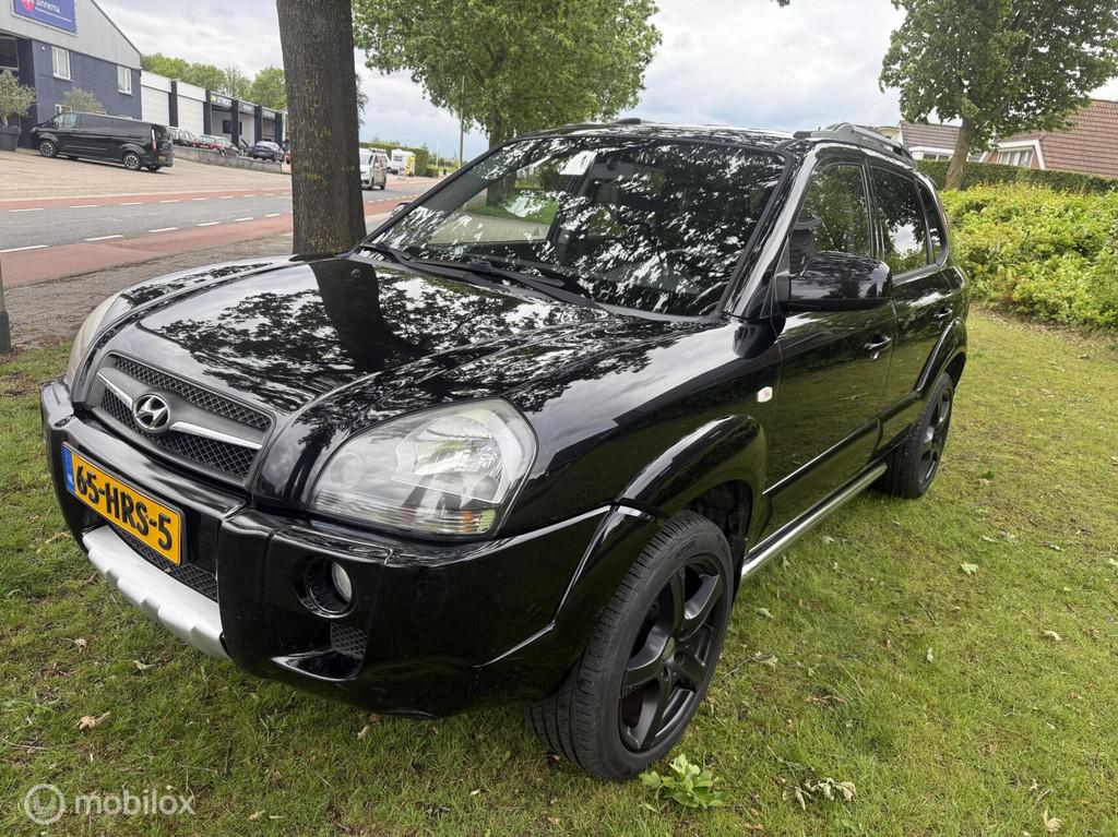 Hyundai Tucson 2.0i Style Supreme, Auto's, Hyundai, 4 cilinders, Zwart, Handgeschakeld, Tucson