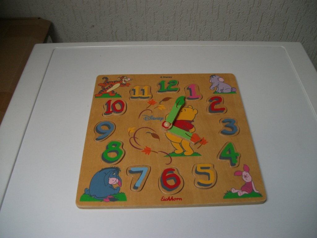 Disney klok puzzel Eichhorn 12 delig, Ophalen of Verzenden, Gebruikt