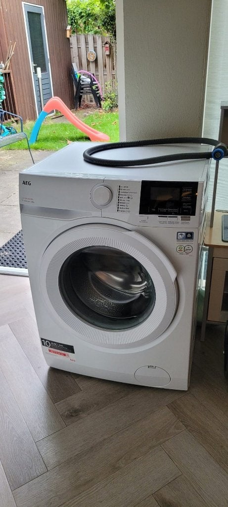 Wasmachine AEG (A-label), Ophalen, Zo goed als nieuw, 85 tot 90 cm, 1200 tot 1600 toeren