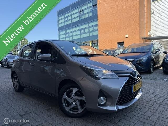 Toyota Yaris 1.5 Hybrid Comfort Full option Camera Automaat, Auto's, Toyota, Gebruikt, Euro 6, 4 cilinders, Bruin