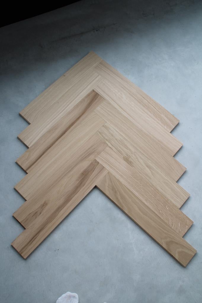 106 m2 echt eiken lamelparket visgraat € 50/m2, Ophalen, Nieuw, 75 m² of meer, Parket
