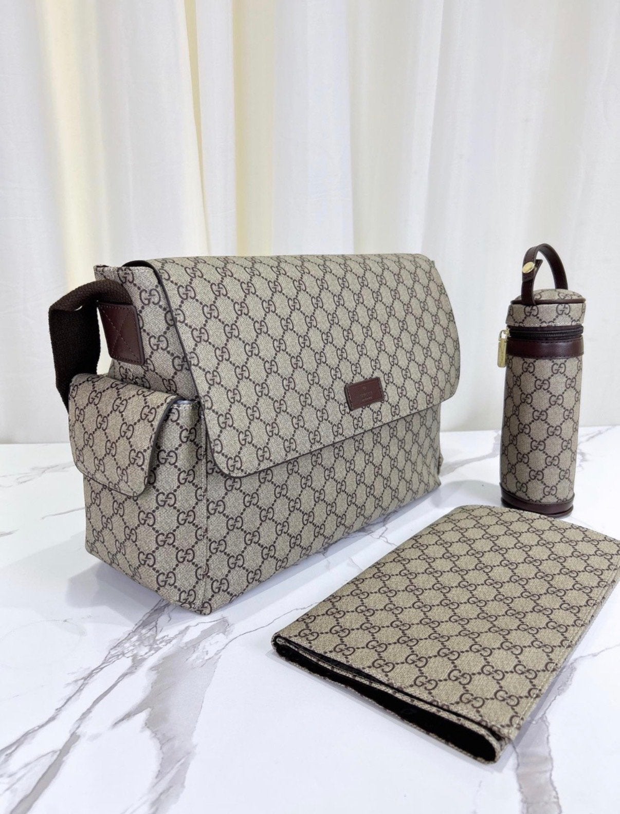 Gucci luiertas met verschoningsmatje en flessenhouder, Kinderen en Baby's, Luiertassen, Verzorgingstas, Bruin, Gucci, Ophalen of Verzenden