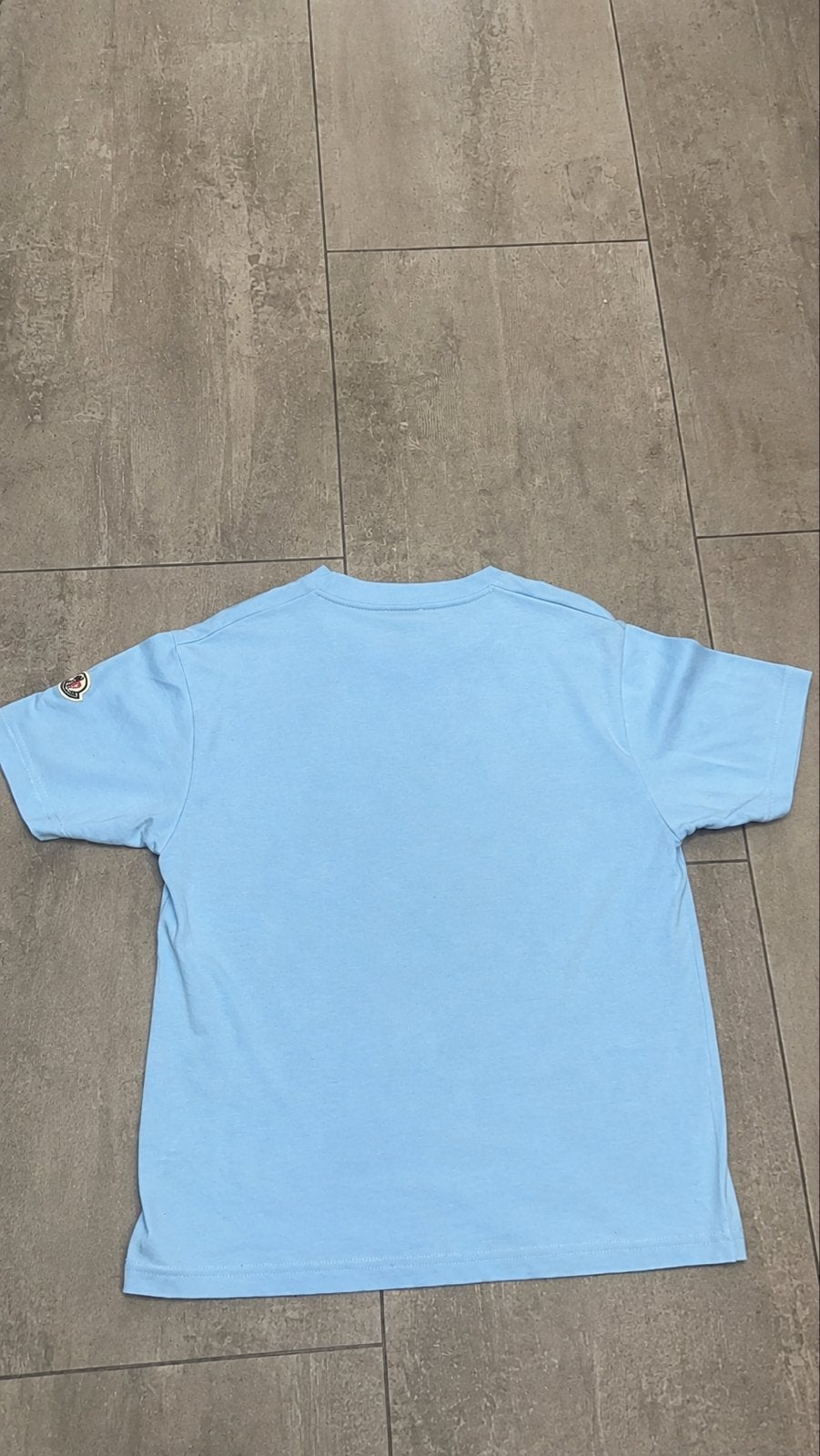 Moncler T-shirt lichtblauw maat M, Ophalen, Zo goed als nieuw, Maat 46 (S) of kleiner, Blauw