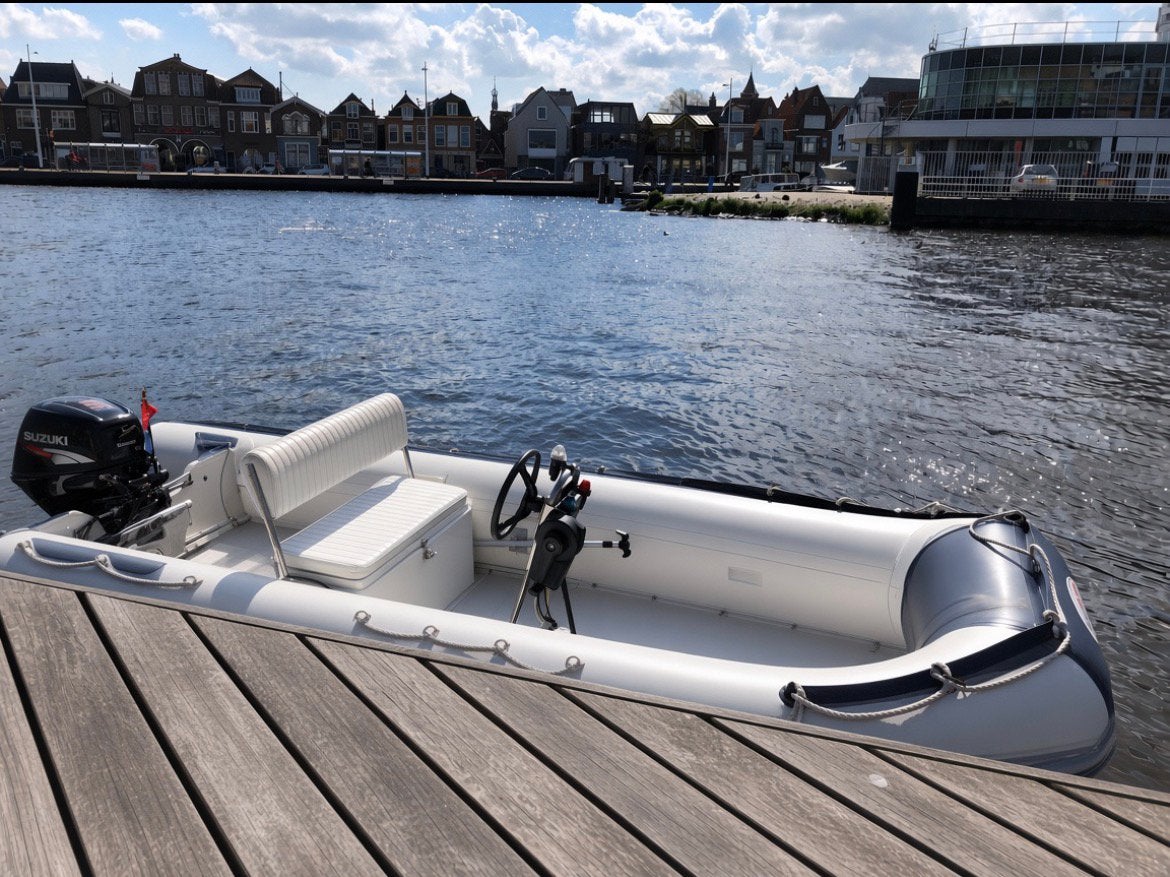 Suzuki 25 PK 4-takt + Trailer + Rubberboot met console, Watersport en Boten, Ophalen, Airdeck, Gebruikt, Stuurconsole