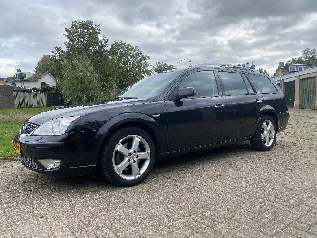 Ford Mondeo 1.8 Platinum 16V 92KW Wagon 2005 Zwart, Auto's, Automatische klimaatregeling, Zwart, 4 cilinders, Leder en Stof