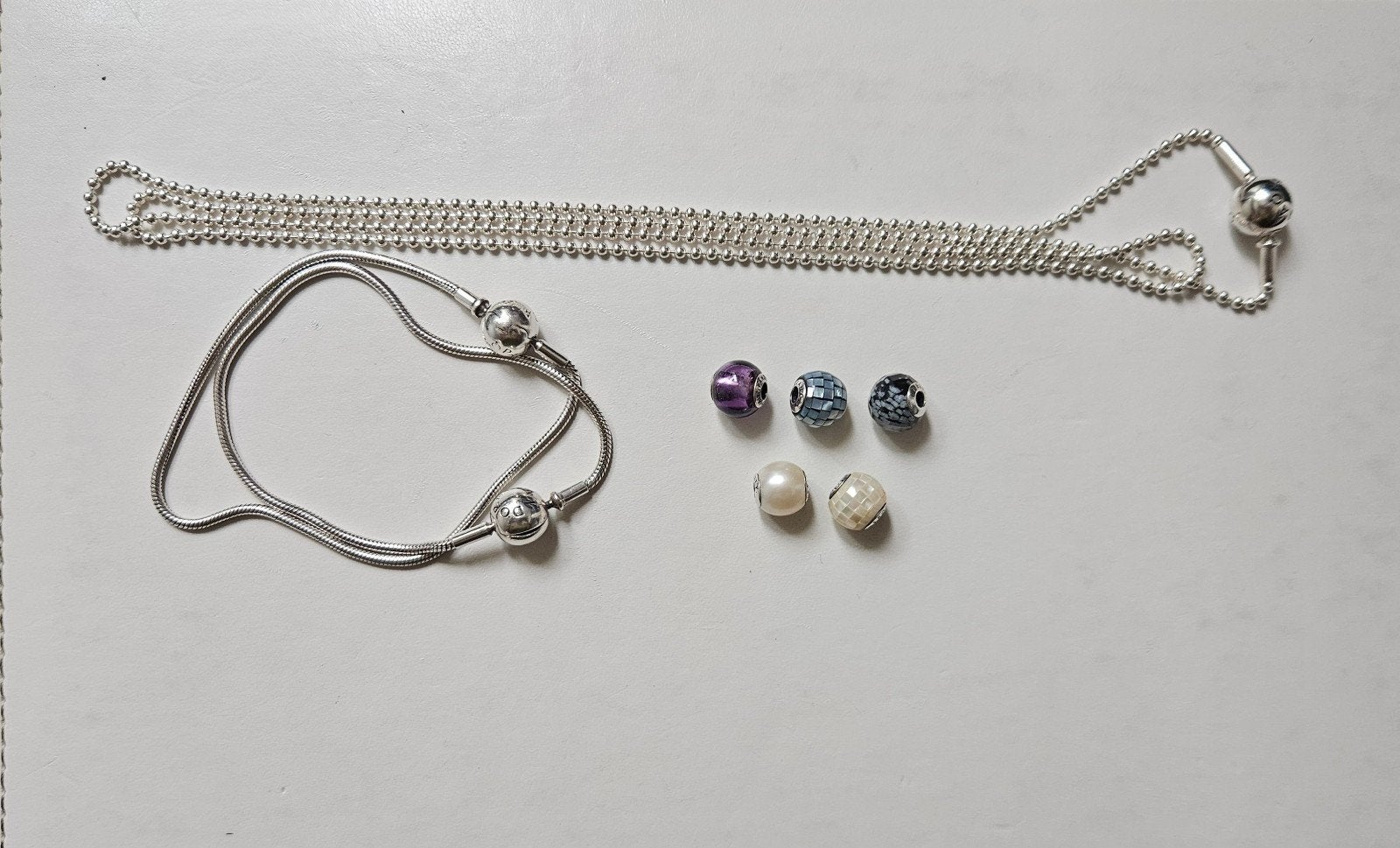 Pandora ESSENCE items te koop (long retired), Sieraden, Tassen en Uiterlijk, Bedels, Ophalen of Verzenden, Zo goed als nieuw, Zilver