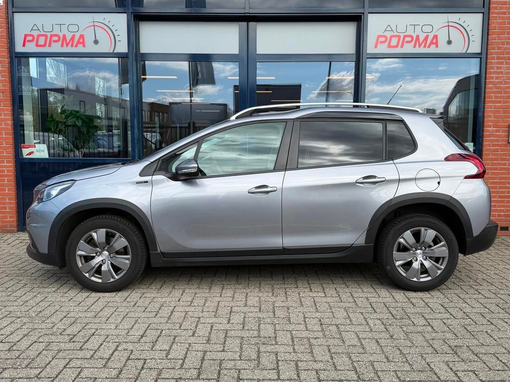 Peugeot 2008 1.2 110pk PureTech Blue Lease Allure / Trekhaak, Auto's, Voorwielaandrijving, Stof, 1199 cc, Bedrijf