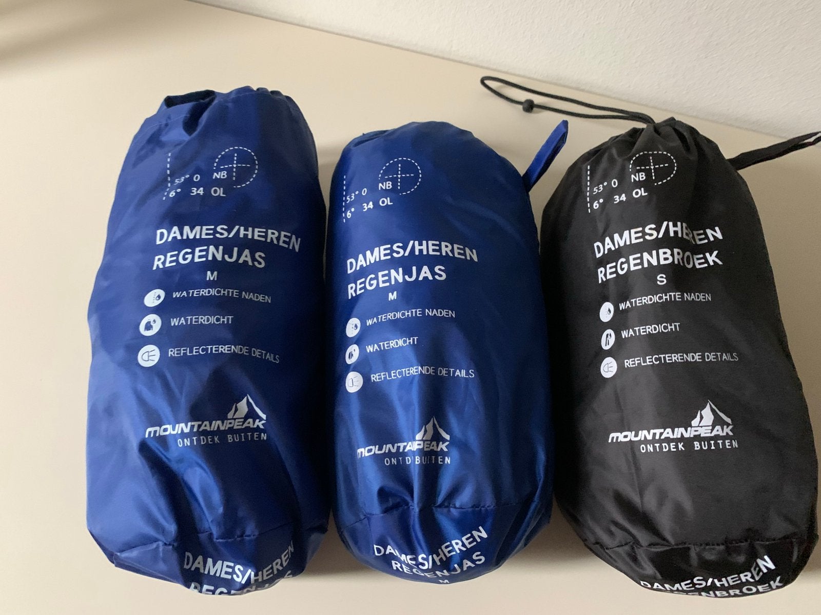 Regenkleding maat S/M - mountainpeak €7  p/ stuk, Ophalen of Verzenden, Nieuw, Regenjas