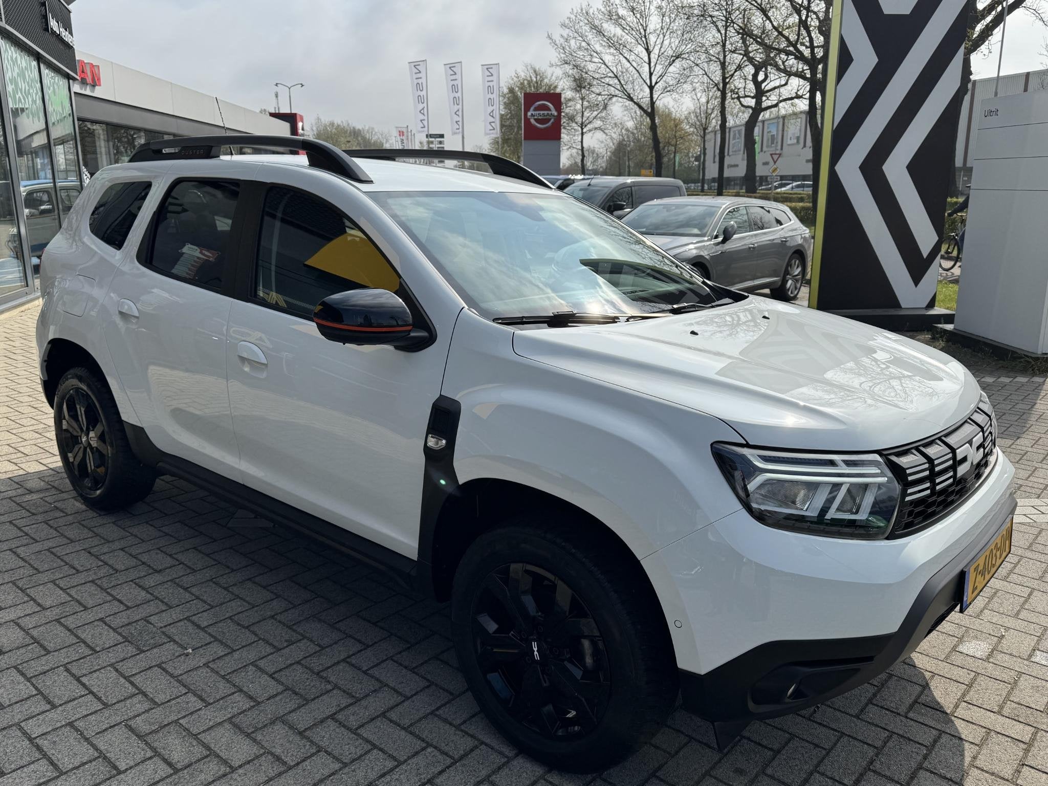 Dacia Duster TCe 150 Extreme Automaat | Achteruitrijcamera |, Auto's, Stof, Gebruikt, 4 cilinders, Wit