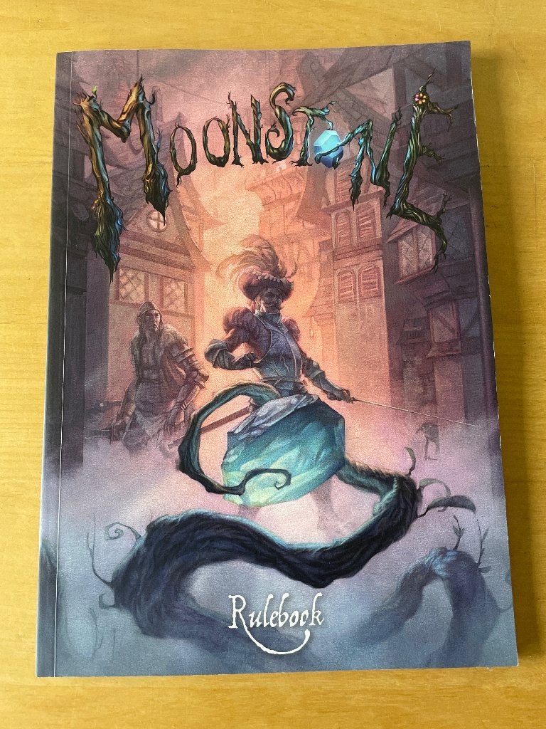 Moonstone regelboek, dobbelstenen, ruler en game pack, Hobby en Vrije tijd, Ophalen of Verzenden, Zo goed als nieuw, Overige soorten