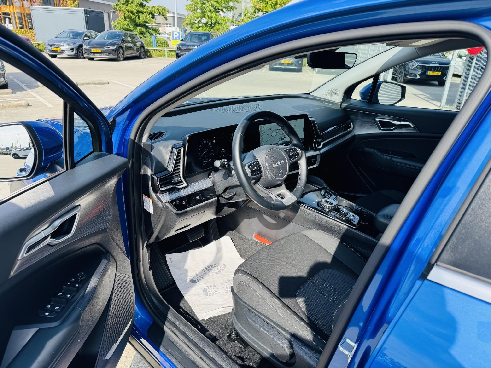 Kia Sportage 1.6 T-GDi MHEV DynamicLine Trekhaak | 1510kg Tr, Auto's, Stof, Gebruikt, Euro 6, 4 cilinders