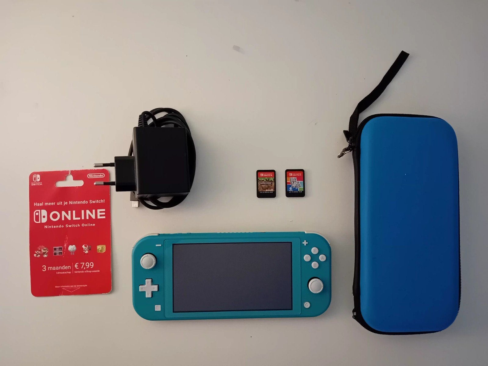 Nintendo lite met 2 spellen, hoes, oplader en abonnement., Spelcomputers en Games, Spelcomputers | Nintendo Switch Lite, Ophalen of Verzenden