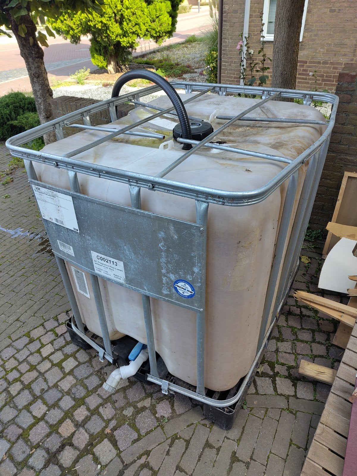 IBC-container 1000L voor regenwateropvang, Ophalen