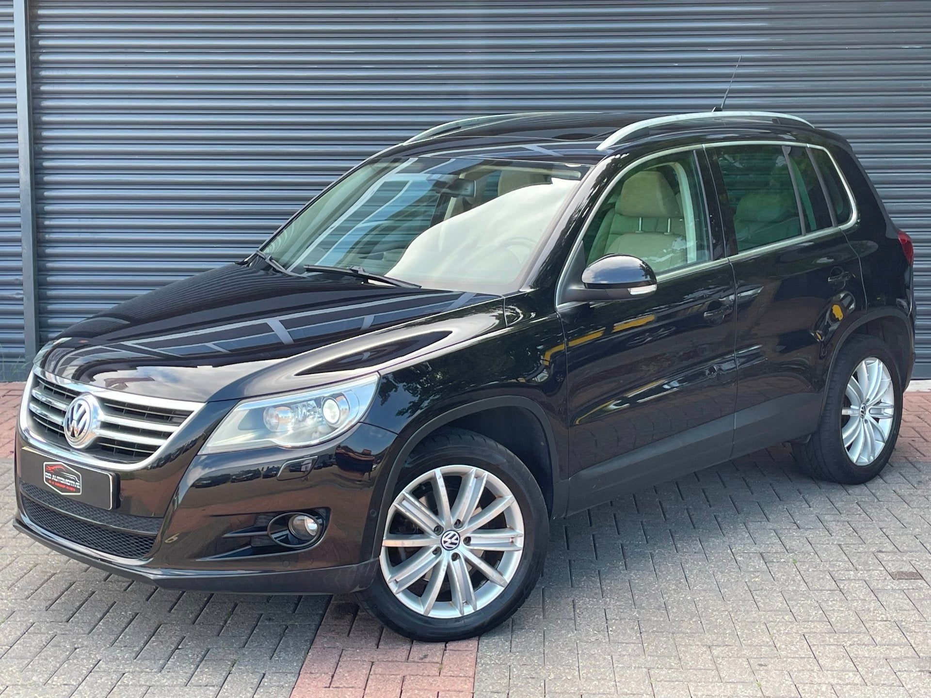 Volkswagen Tiguan 2.0 TSI Sport&Style 4Motion Automaat | Pan, Auto's, Automaat, Gebruikt, Beige, 4 cilinders