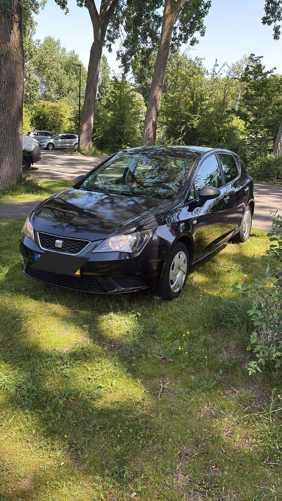 Seat Ibiza 1.4 63KW 5DRS 2012 Zwart, Auto's, Voorwielaandrijving, Stof, Zwart, 4 cilinders