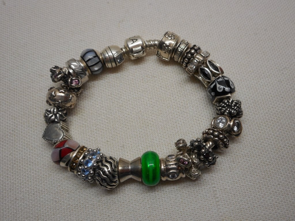 Zilveren Amora armband met 25 zilveren bedels nr.032, Verzenden, Zo goed als nieuw, Met bedels of kralen, Zilver