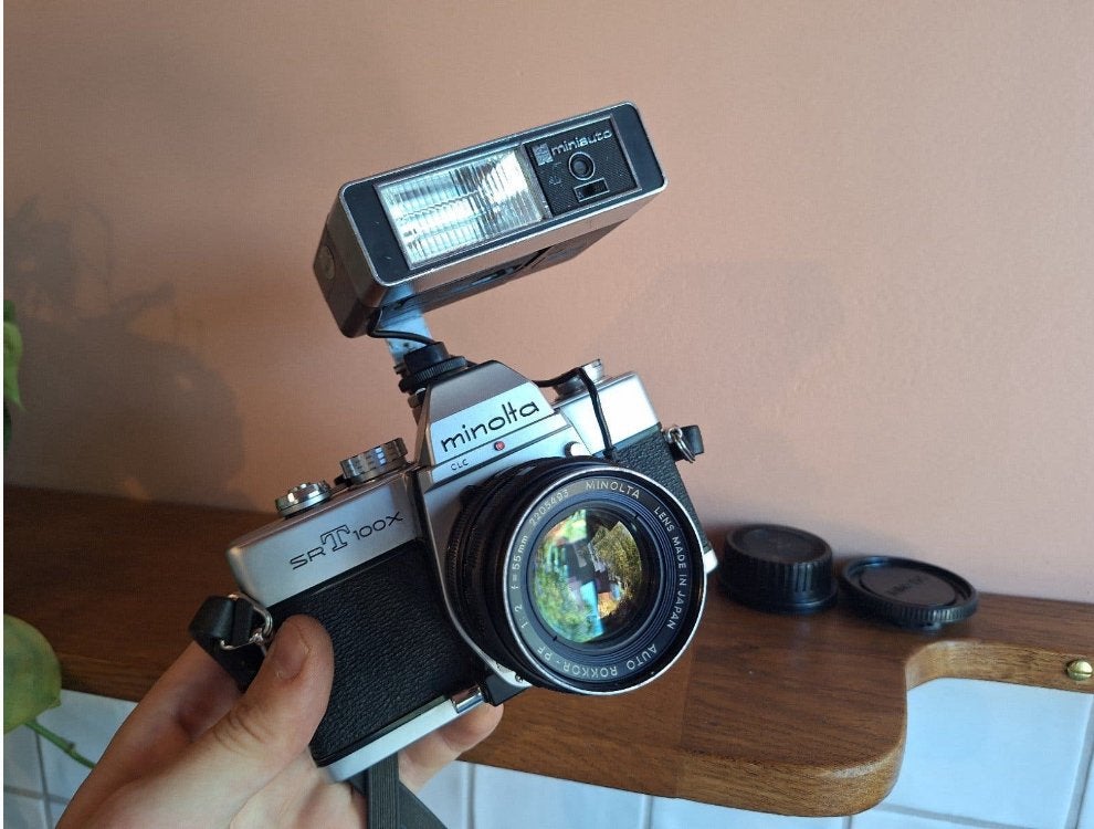 Minolta SRT100x met 55mm en flits, Ophalen of Verzenden, Zo goed als nieuw, Spiegelreflex, Minolta