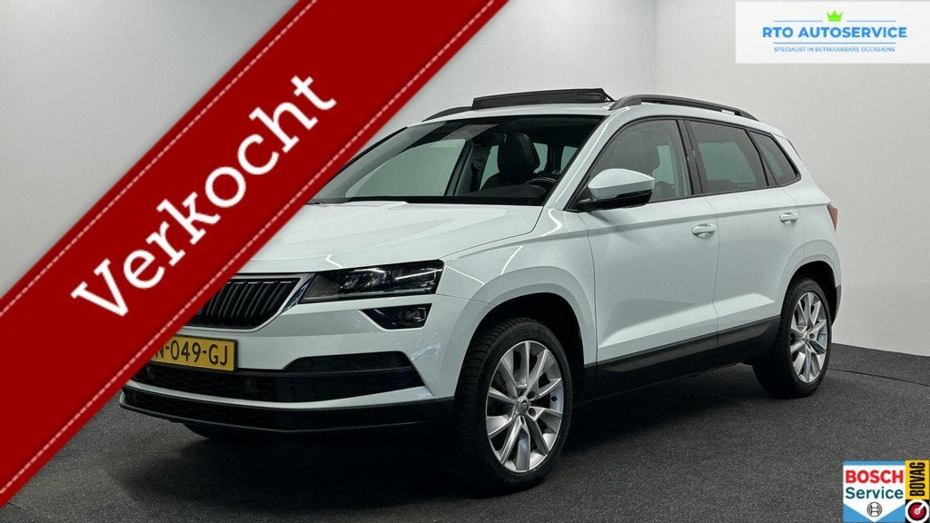 Skoda Karoq 1.5 TSI ACT Style Business PANO TREKHAAK CARPLAY, Auto's, Skoda, 4 cilinders, Wit, Karoq, Bedrijf